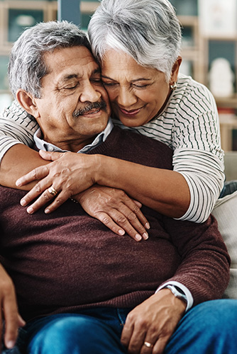 senior couple hugging